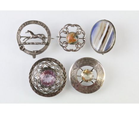 Five silver brooches, to include Scottish amethyst silver target brooch, the round mixed cut amethyst diameter approx 20mm, p