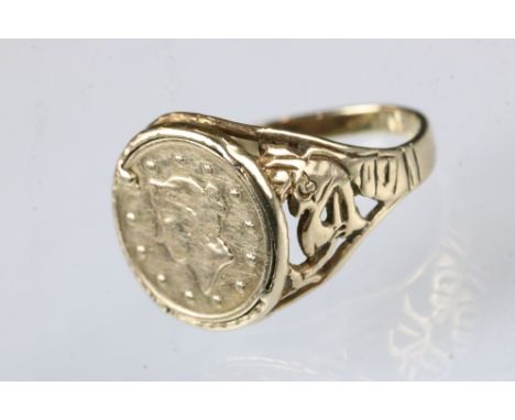 9ct gold coin signet ring, American coin to the head, pierced shoulders, ring size P½ 