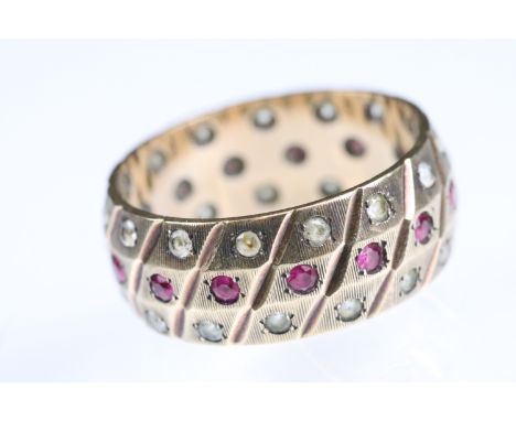 Synthetic ruby and white stone 9ct gold eternity ring, flush bead settings, textured band, width approx 7mm, ring size N 