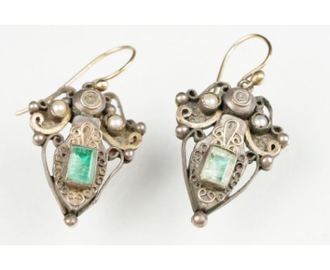 Pair of 19th century Indian foiled gemstone and pearl white metal and yellow metal set drop earrings, the stylised triangular