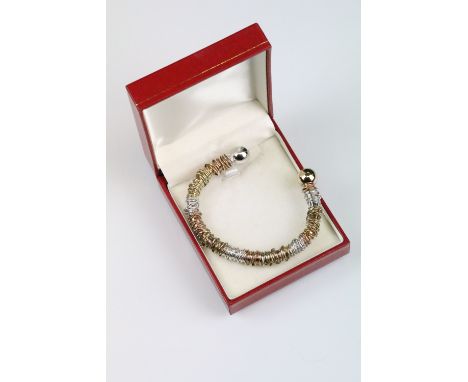 Jane Watling parcel gilt silver wirework bangle, rose gold plated and yellow gold plated sections, sphere terminals, width be