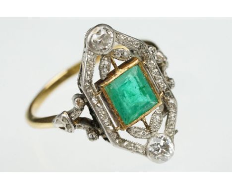 Art Deco emerald and diamond unmarked yellow gold and platinum ring, the square step cut emerald measuring approx 6 x 5.5mm, 