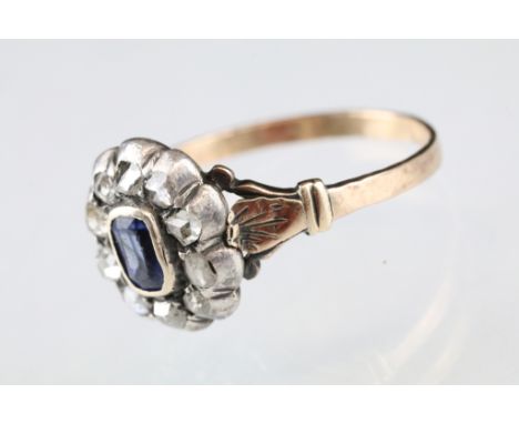 19th century sapphire and diamond unmarked gold and silver cluster ring, oval mixed cut sapphire to the centre, dimensions ap