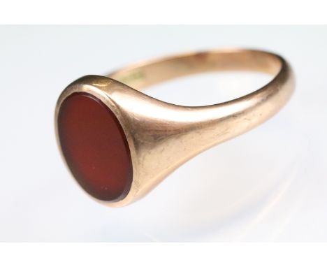 Carnelian 9ct gold Gents signet ring, oval panel carnelian, dimensions approx 12.5 x 10.5, rubover flush set, tapered shoulde