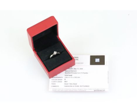 Diamond solitaire platinum ring, princess cut diamond, claw set, tapered shoulders, ring size L½, with IGI diamond certificat