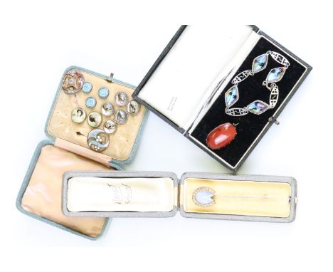 Butterfly wing silver panel bracelet; a carnelian rose metal brooch; a plated stick pin; a collection of buttons to include f