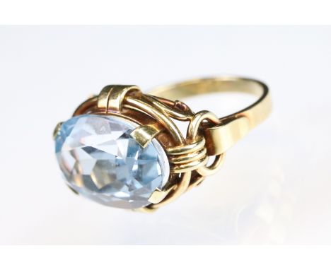 Blue topaz 14ct yellow gold ring, oval mixed cut topaz, dimensions approx 11 x 16mm, claw set, fancy scroll and band, ring si