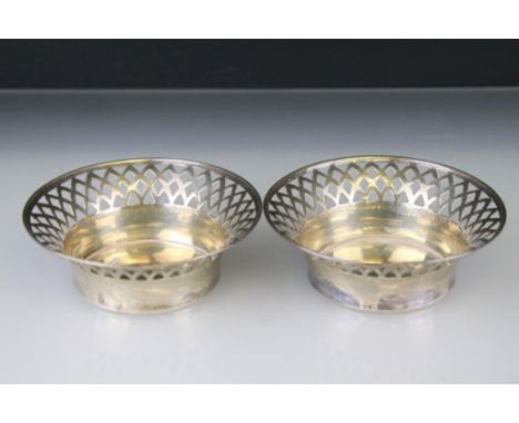 Pair of Edwardian silver circular trinket dishes, pierced fretwork flared border, makers Harrison Brothers &amp; Howson, Shef