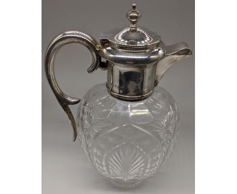 A silver and cut glass claret jug, hallmarked London, 1905, maker John Grinsell &amp; Sons, H.25cm