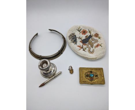 A group of miscellaneous items to include a torque necklace, silver candlestick and pencil and a beaded purse