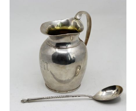 A 19th century Russian silver jug, stamped St.Petersburg City mark, 84, H.12cm, together with a mid 20th century Latvian silv