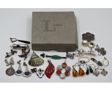 A large collection of silver jewellery to include pearls, amber, malachite, Deco pieces, Middle Eastern brooch etc.