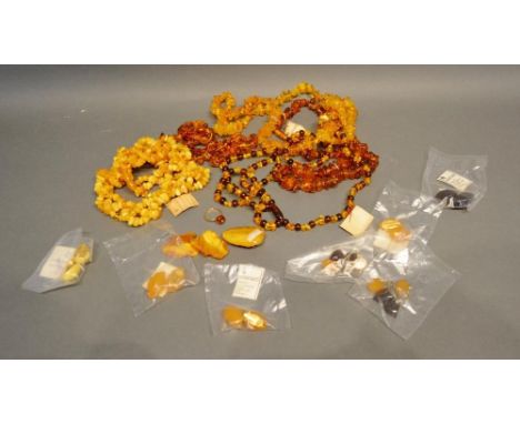 A Collection Of Amber Bead Necklaces, Together With A Gold Amber Set Ring and other related items 