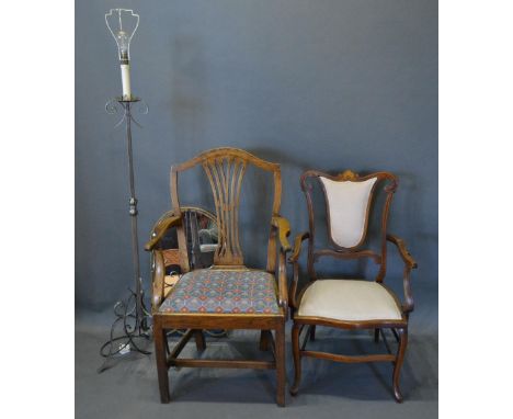 A Wrought Iron Lamp Standard Together With A Wall Mirror of arch form and two side arm chairs 