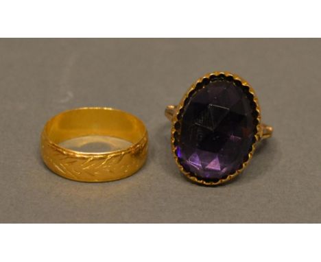 A 9ct. Gold Amethyst Set Dress Ring, 8.8g Together With A 22ct. Gold Wedding Band, 5g 