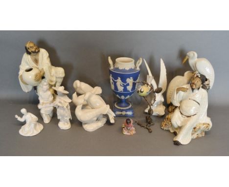 A Wedgewood Jasper Ware Two Handled Pedestal Vase, decorated in relief with classical figures, 22cm tall, together with a Roy