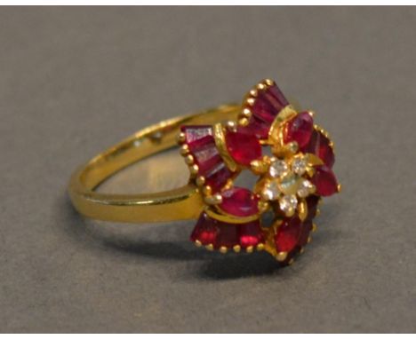 A 14ct. Gold Ruby &amp; Diamond Cluster Ring 