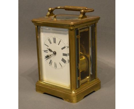 A 19th Century French Brass Cased Repeater Carriage Clock, the enamel dial with Roman numerals and with lever escapement stri