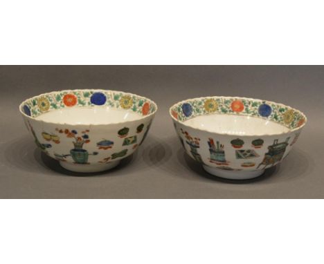 A Pair Of Early 19th Century Chinese Porcelain Bowls Decorated with antiquities and implements in polychrome enamels, blue se