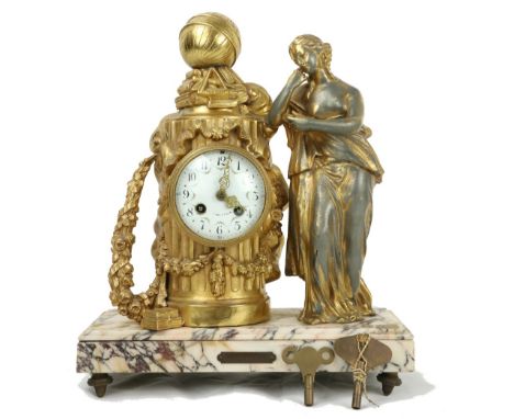 A 19th Century French ormolu Mantle Clock, depicting a young girl with book in hand resting against a stylized pillar, and de