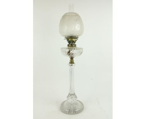 An unusual cutglass Oil Lamp,&nbsp;with baluster shaped facet cut stem and reeded glass reservoir supporting an etched glass 