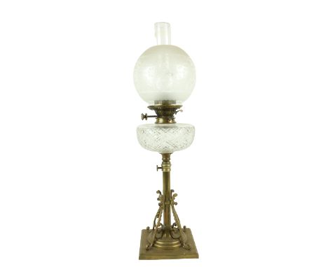 A good telescopic brass and cutglass Oil Lamp,&nbsp;with cutglass reservoir and etched bulbous glass shade, 28" (71cms). (1)