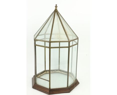 A very attractive brass and mahogany Terrarium,&nbsp;of architectural form, the octagonal frame with 17 glass plates and a po