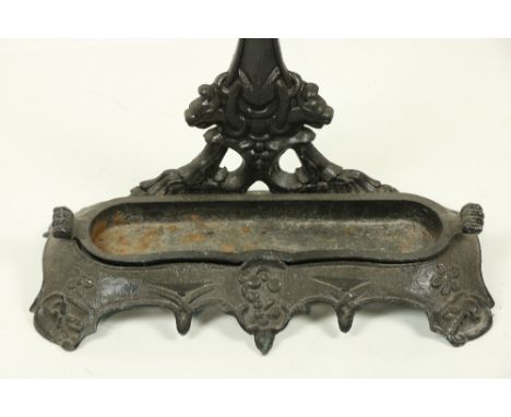 A Victorian cast iron Stick and Umbrella Stand, decorated with grapes and vine leaves on shaped base. (1) 