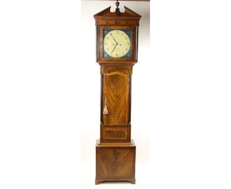 An Irish Georgian period mahogany framed Grandfather Clock, the break top cornice with finial surmounted over a frieze with m