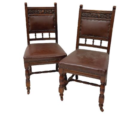 A set of 10 Edwardian&nbsp;walnut Dining Chairs, each back with a frieze carved with vines or fruit on scrolling foliage abov