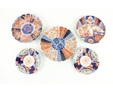 A pair of Japanese Imari porcelain&nbsp;Plates,&nbsp;8 1/2" (22cms), a similar larger shell shaped ditto, 10 1/2" (27cms), an