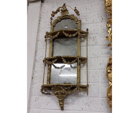 A pair of 19th Century gilt three tier mirror Wall Brackets, both distressed; together with a pair of two handled brass tripo