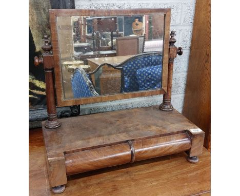 An early Victorian flame mahogany swing framed Dressing Table Mirror, with rectangular plate and two frieze drawers on four b