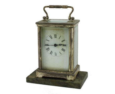 A small 19th Century English brass cased Carriage Clock,&nbsp;on a green marble base (loose). (2) 