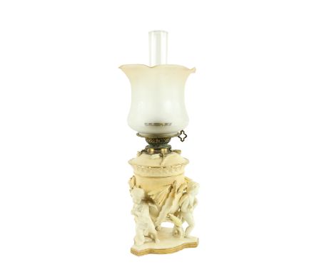 An attractive 19th Century Moore Brothers porcelain Oil Lamp,&nbsp;in white and cream, the body and removable reservoir encru