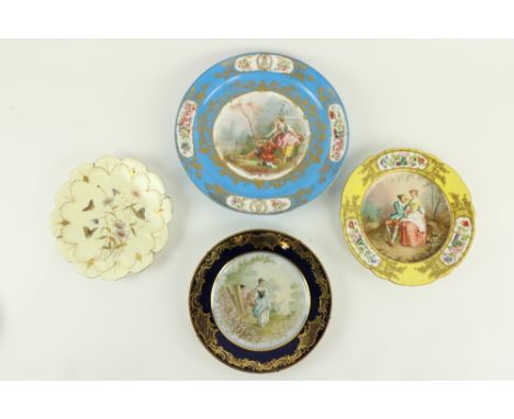An attractive Serves style large porcelain Dish, decorated with figures in a garden on celeste blue ground and floral panel, 