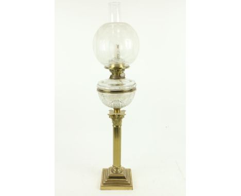 A very fine late 19th Century Corinthian brass Oil Lamp, with reeded column on square stepped base supporting a cutglass rese