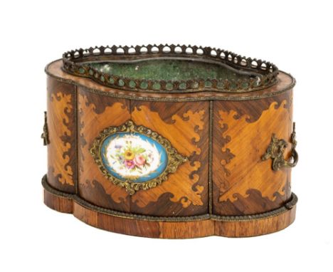 A good oval serpentine shaped French kingwood and satinwood inlaid Jardinière, with brass handles, and a porcelain panel with