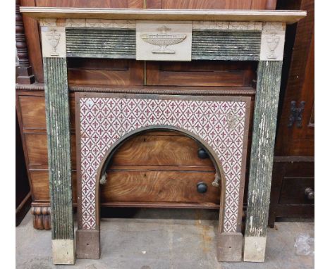 An Adams style painted pine Chimneypiece, in simulated marble the centre panel with a large urn in relief issuing drapes and 