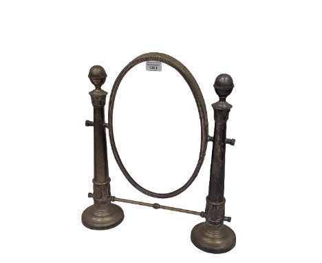 A silver plated oval swing frame Dressing Table Mirror, with upward tapering column supports on two moulded circular bases, 2