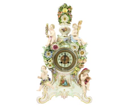 An attractive Meissen&nbsp;porcelain flower encrusted Clock, c. 1900, with floral finial above four cherubs emblematic of the