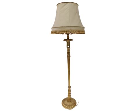 A giltwood Lamp Standard, on circular base with salmon coloured frill shade. (1) 
