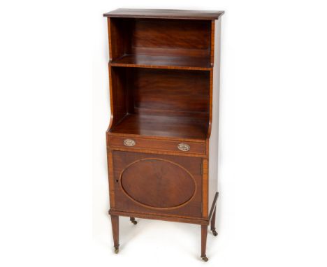 A small mahogany and crossbanded Open Waterfall Bookcase, with cupboard,&nbsp; two shelves, a frieze drawer and a cupboard do