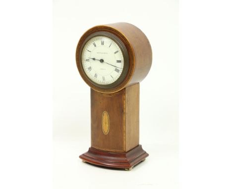 A miniature inlaid and crossbanded Table Clock, in the form of a longcase, the circular enamel dial with Arabic &amp; Roman n