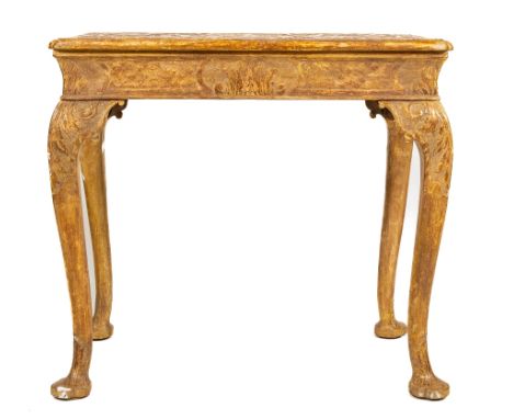 A fine early carved giltwood and gesso Centre Table, the rectangular moulded top with re-entrant corners profusely flat chase