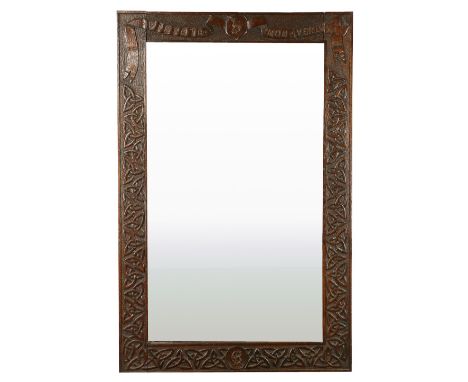 A Celtic carved oak Wall Mirror, crested and with the motto 'Virtule Non Verbis' on a ribbon design, 35"h x 23"w (89cms x 58c