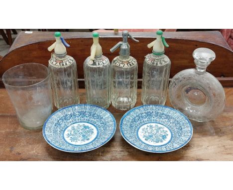 A fine engraved doughnut Decanter and stopper, 26cms high (10"), together with a fine glass Ice Bucket crested with the date 