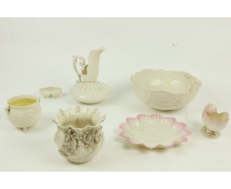 A collection of Belleek Parian ware, Second Period (1891 - 1926), comprising an ornate jug, 8" (29cms), a small shell sweet m