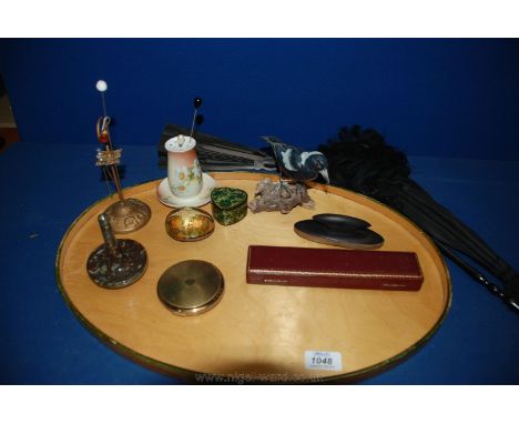 An oval Tray, two hat pin holders and pins, model of a bird, compact etc