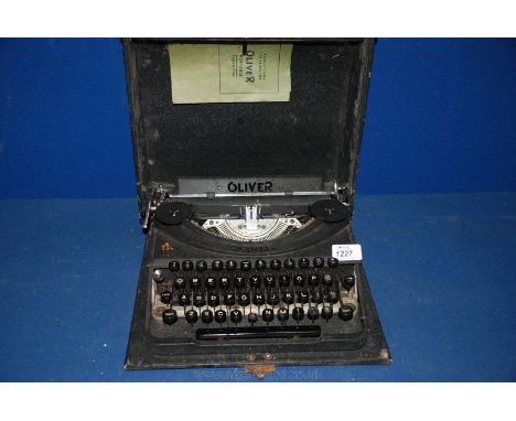An old Oliver Typewriter in case, a/f.